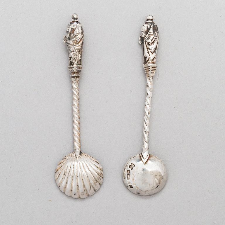 A pair of silver saltcellars, maker's mark of John Edward Wilmot, Birmingham year 1900, and two silver salt spoons.