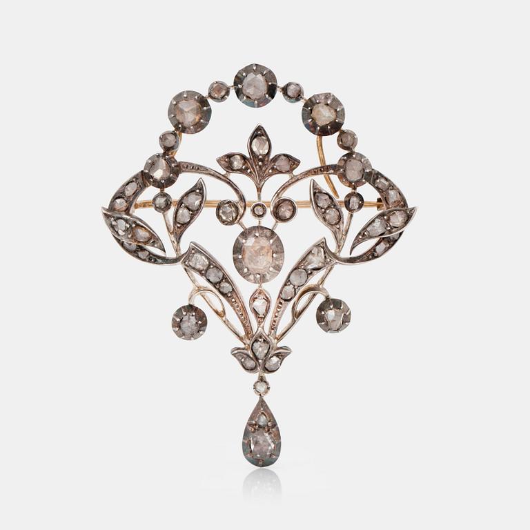 A rose-cut diamond brooch.