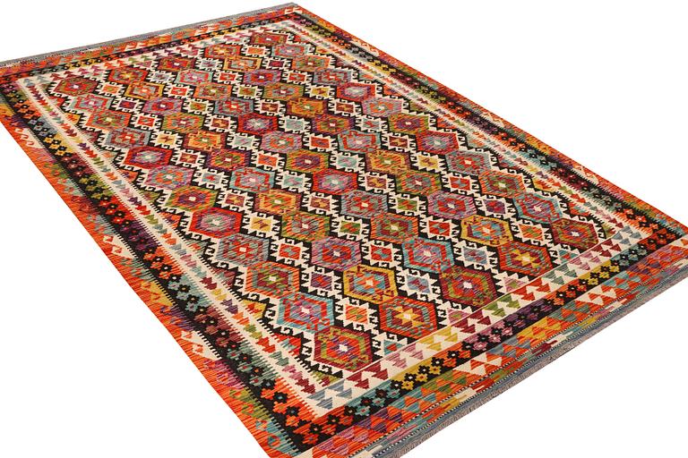 An Afghan Kilim carpet, c. 298 x 202 cm.