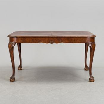 A 1920's 7 piece Chippendale-style dining group.