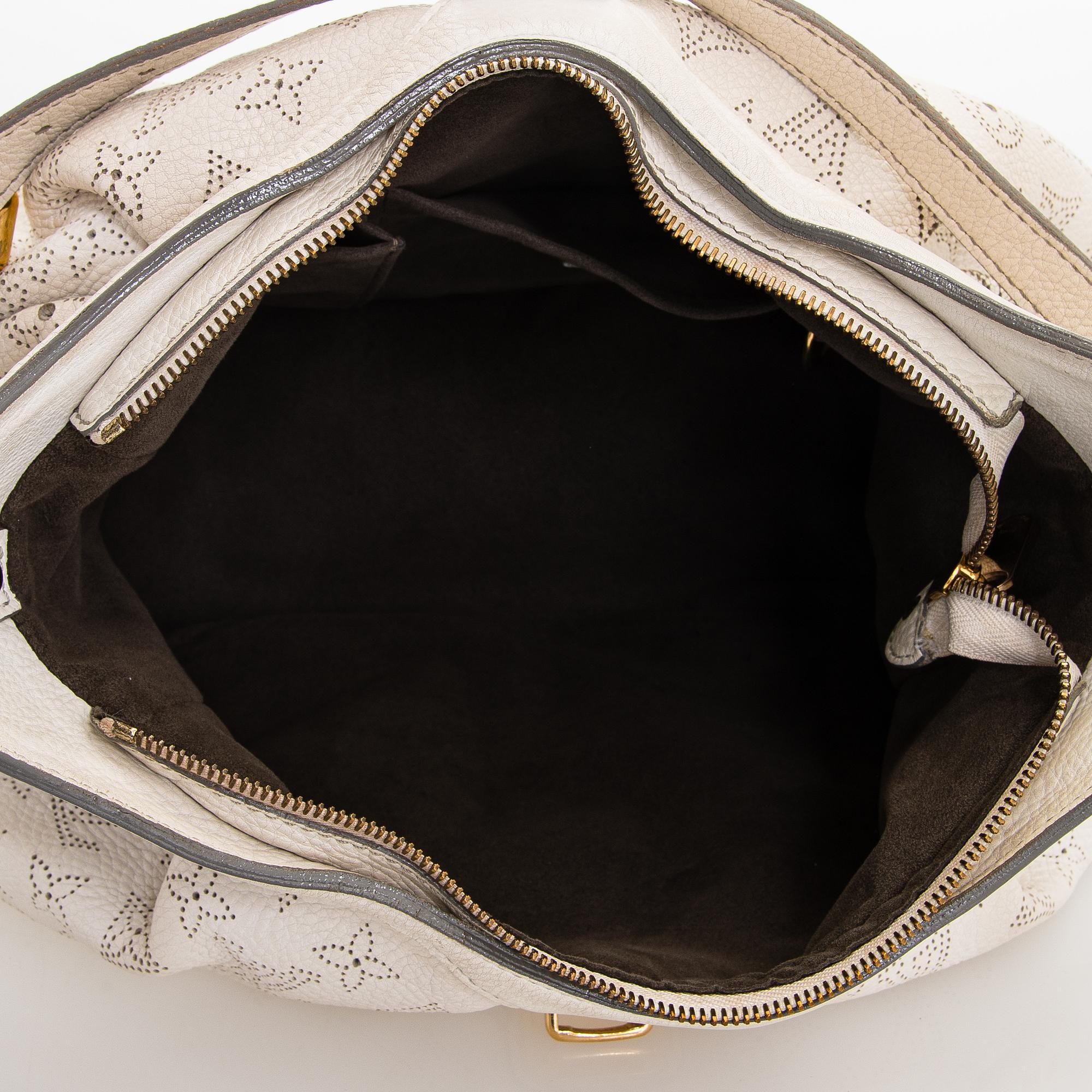 Louis Vuitton, a 'White Monogram Mahina XS' Bag.