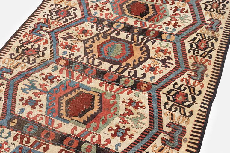 An antique central Anatolian kilim, possibly Konya, c. 339 x 140 cm.