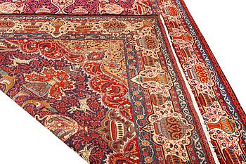 A Kashmar carpet, c. 415 x 285 cm.