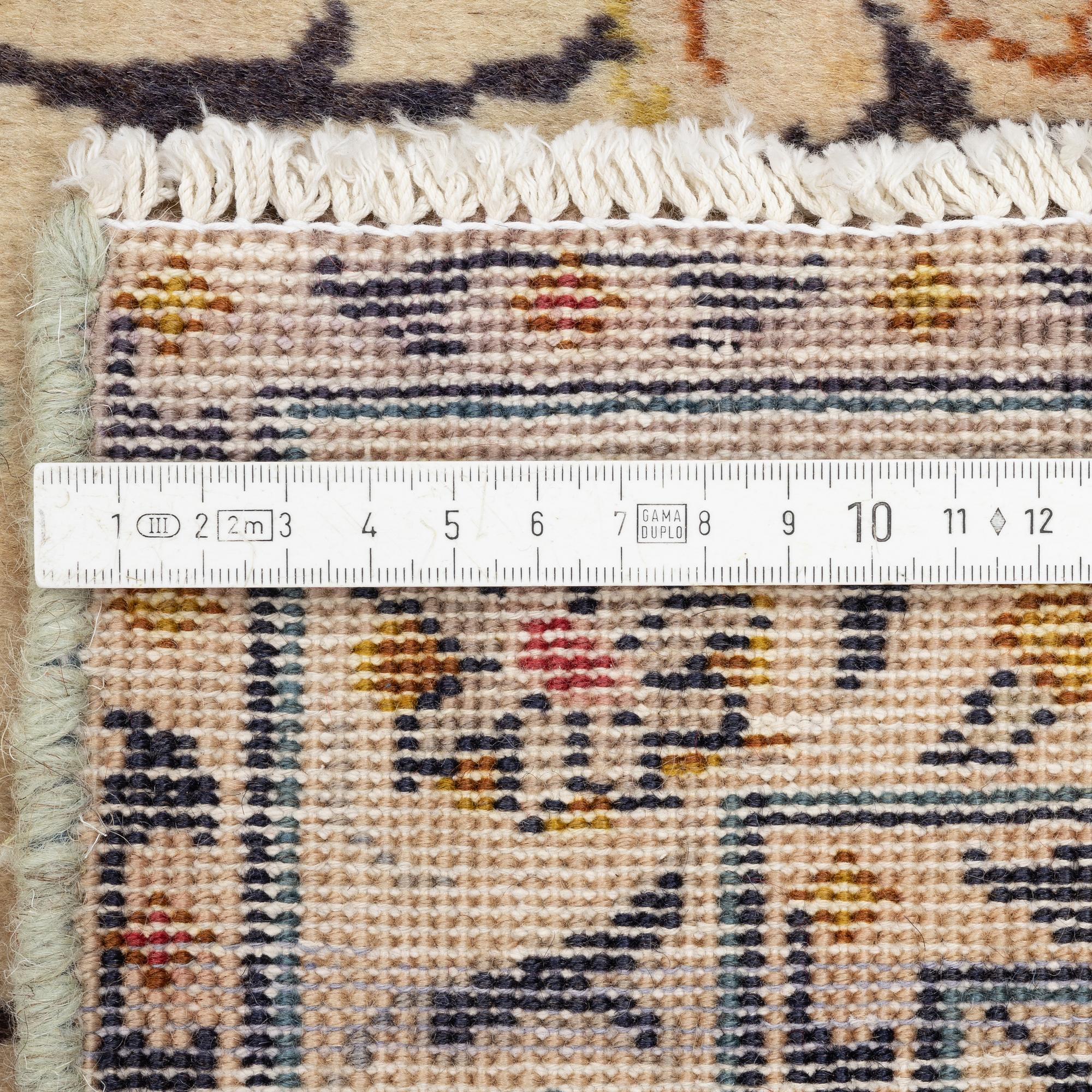 A carpet, Keshan, c. 306 x 214 cm.