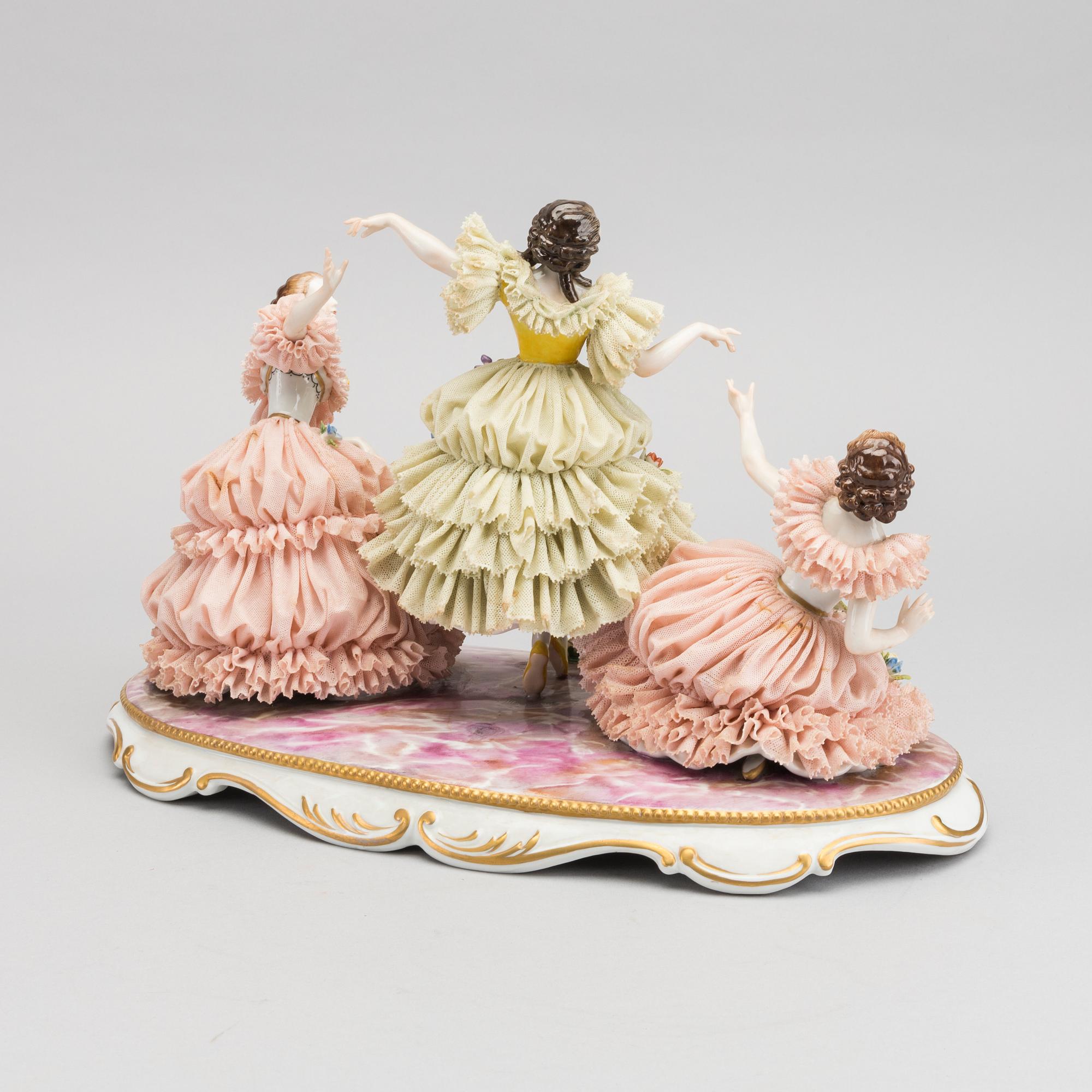 A porcelain figurine with Capodimonte looking mark.