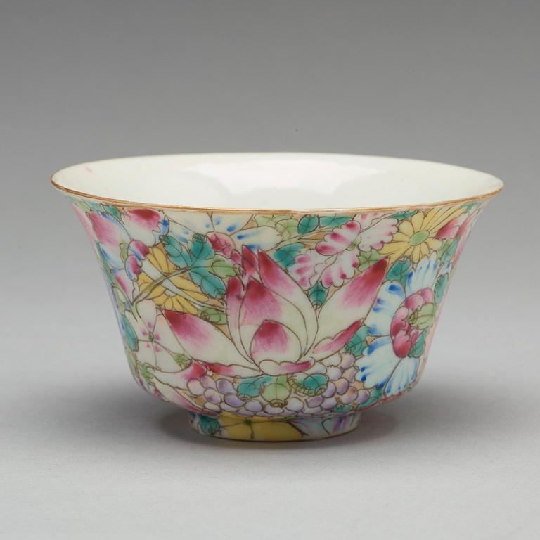 A set of six Chinese 'mille fiori' tea cups with covers and stands, and 12 small dishes, circa 1900.