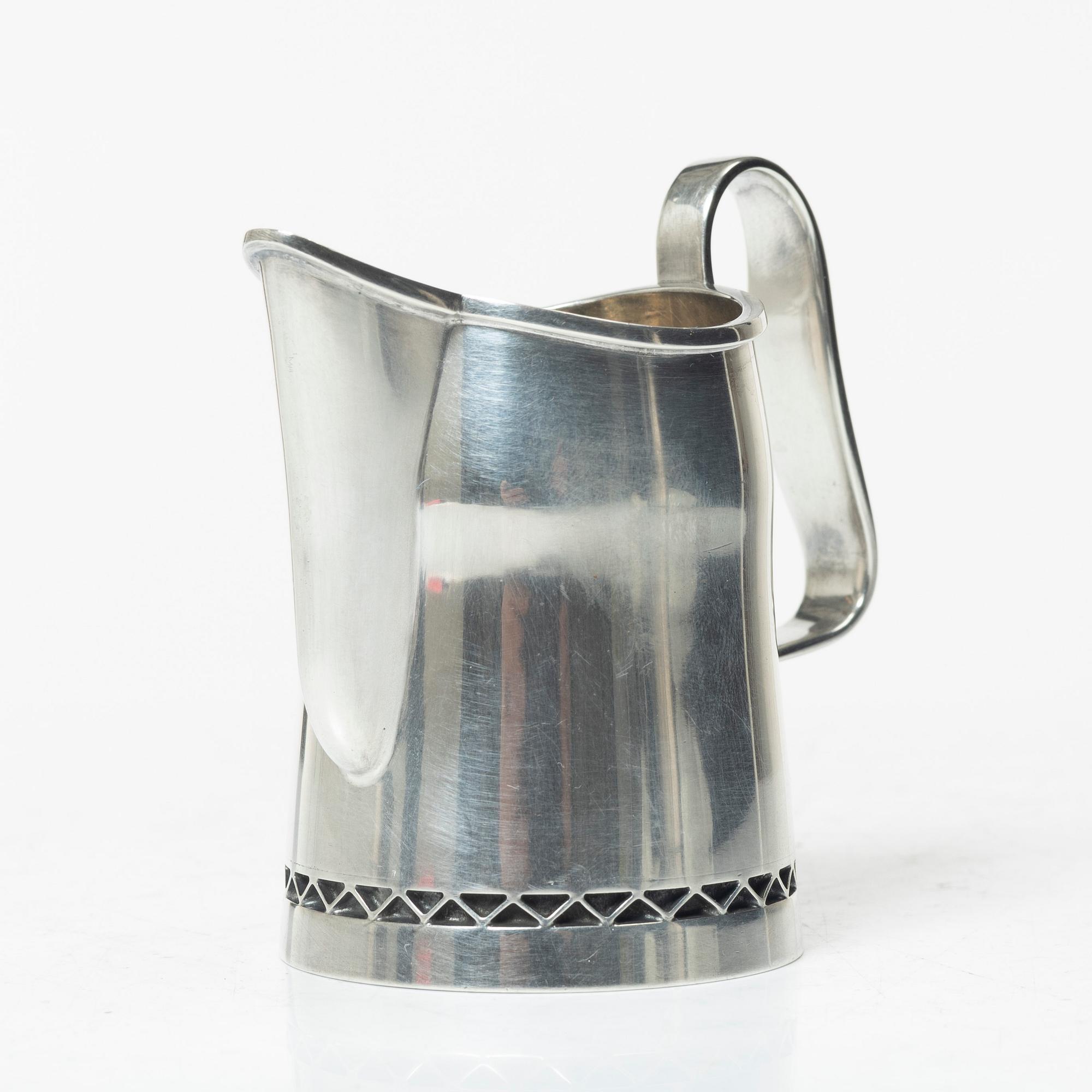 A three-piece silver coffee service by Helge Lindgren for K. Andersson, Stockholm, 1958.