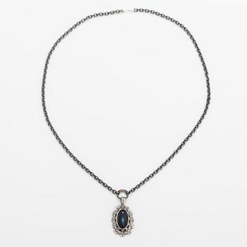 Jorma Laine, A silver necklace "Lemmikki" witha spectrolite. Turun Hopea, Turku.