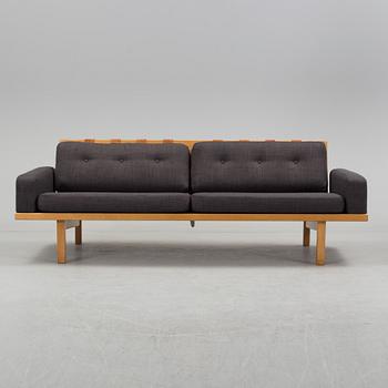 A 'Tornade' sofa and a 'Cadett' easy chair by Eric Merten, IRE möbler, Skillingaryd, Sweden.