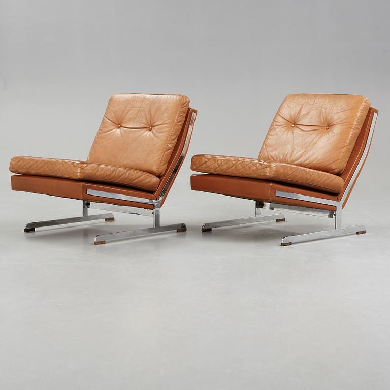 A pair of Poul Nørreklit chromed steel and brown leather easy chairs, Selectform, Denmark 1960's.