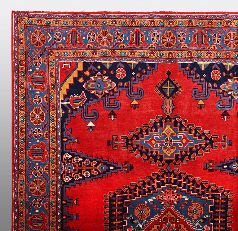 A CARPET, Wiss Signed Sharbani.  327 x 227 cm.
