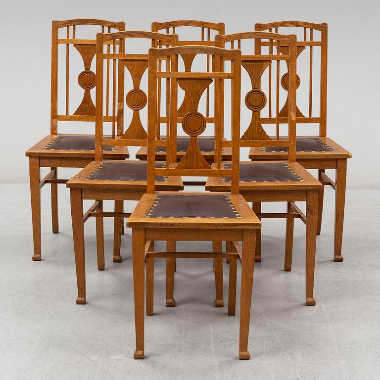 Six early 20th century oak chairs.