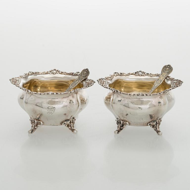 Black Starr & Frost, a pair of sterling silver shakers and sugar bowls, USA around 1900, Gorham pair of sterling spoons.