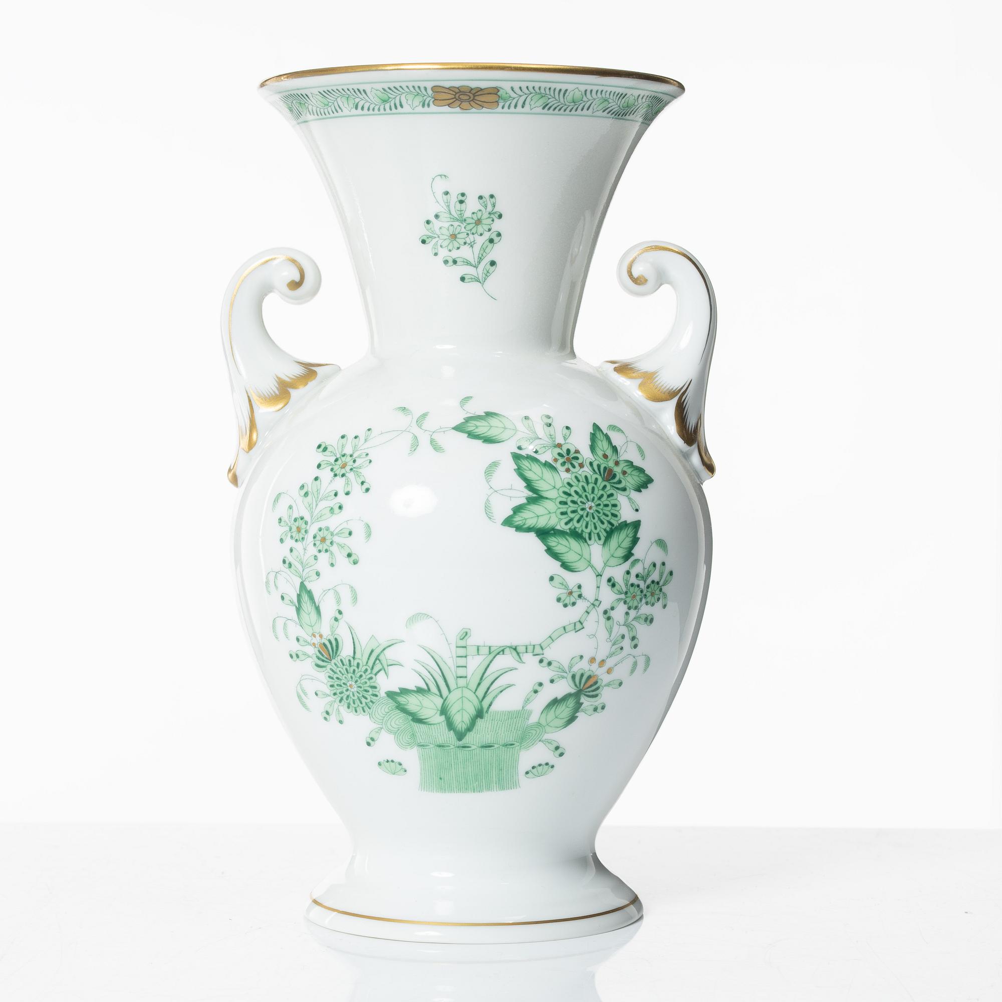 A 42-piece 'Chinese Bouquet' porcelain service and six 'Waldstein rose' coffee cups with saucers, Herend, Hungary.