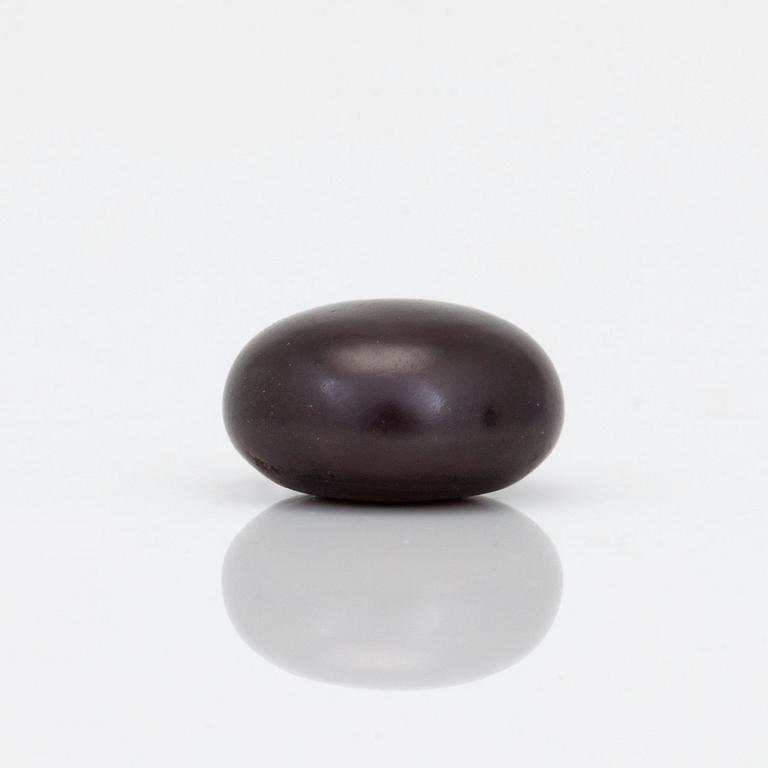 A part-drilled brownish-black natural saltwater loose pearl. Certificate from The Gem and Pearl Lab.