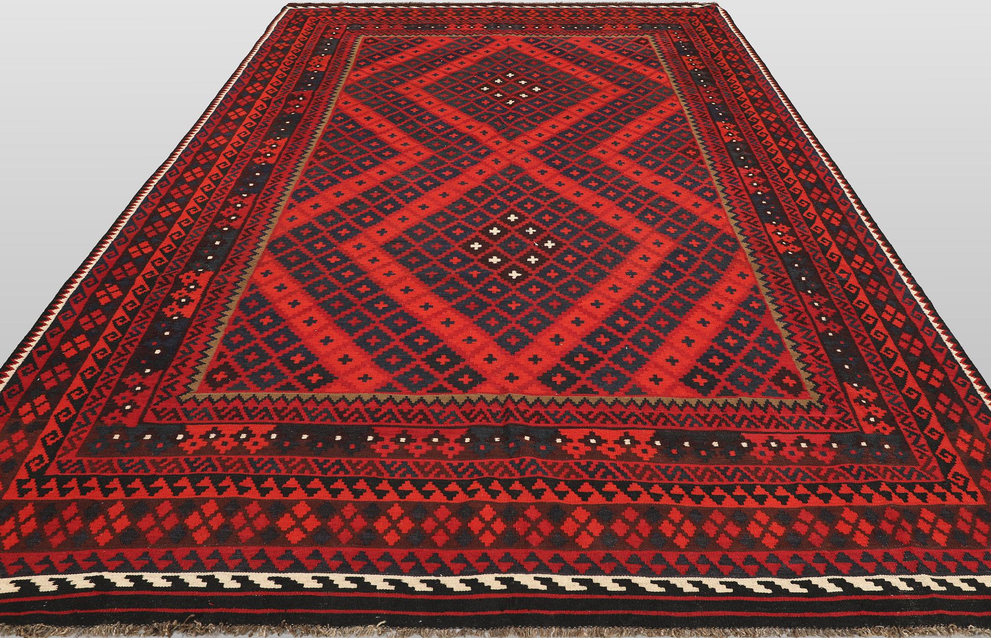 A Afghan kelim carpet, 361 x 241 cm.