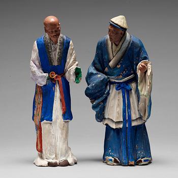 184. Two clay figures of chinese men, Qing dynasty, 19th Century.