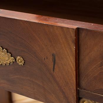An Empire style dressing table by Johan Öman, Stockholm (1815-33), dated 1827.