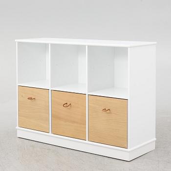A chest of drawers/bookcase, Oliver Furniture.