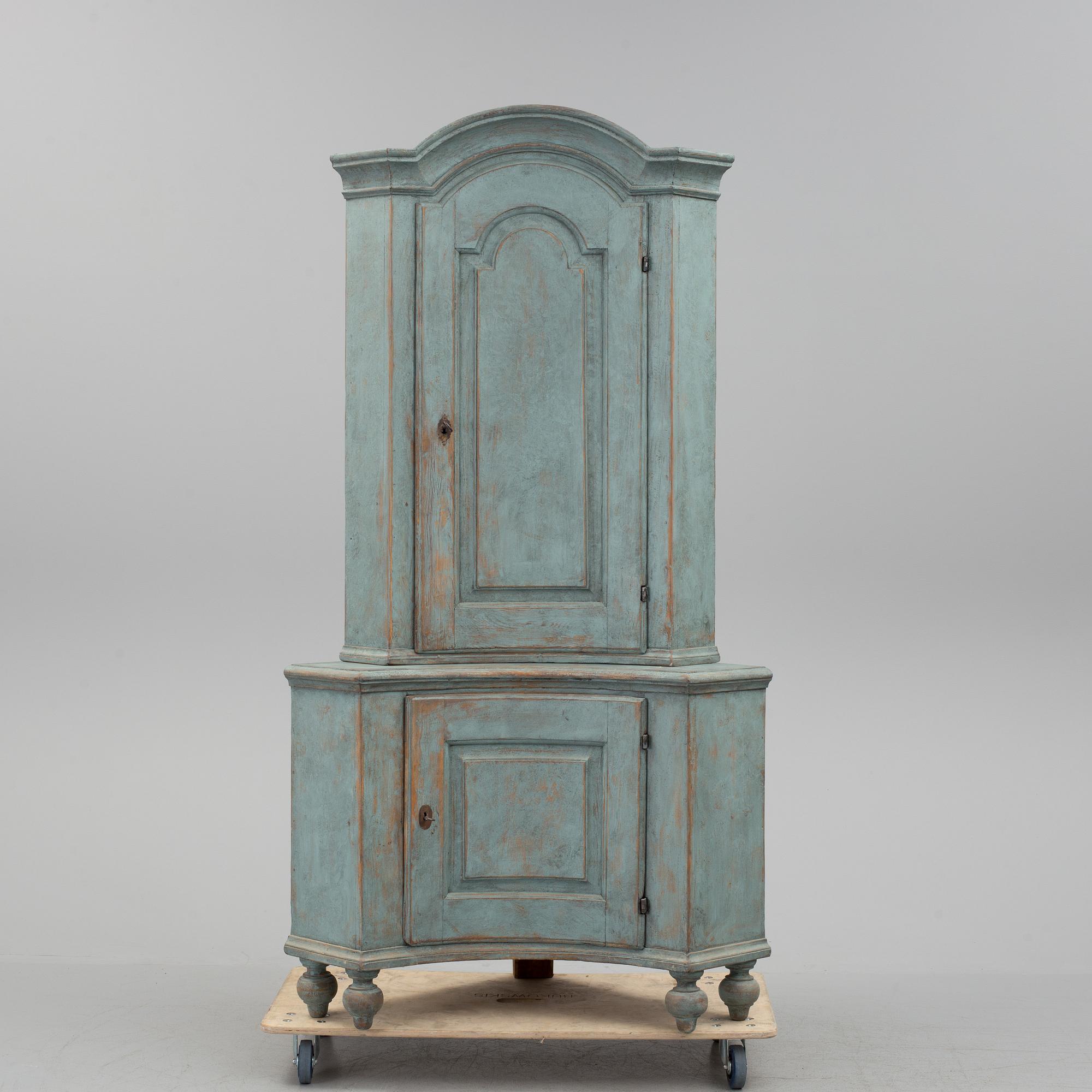 A 18th century corner cabinet.