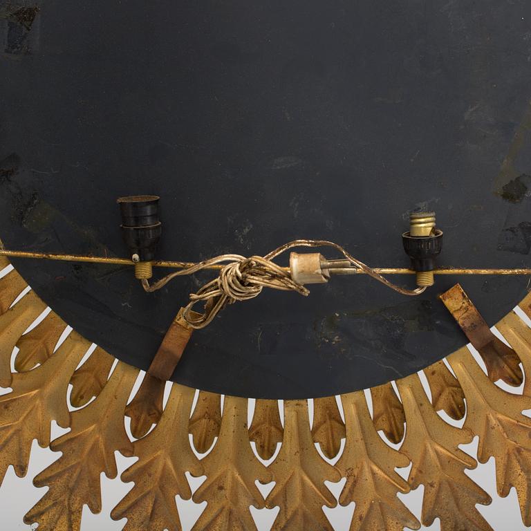 A mid 20th century sun-shaped mirror.