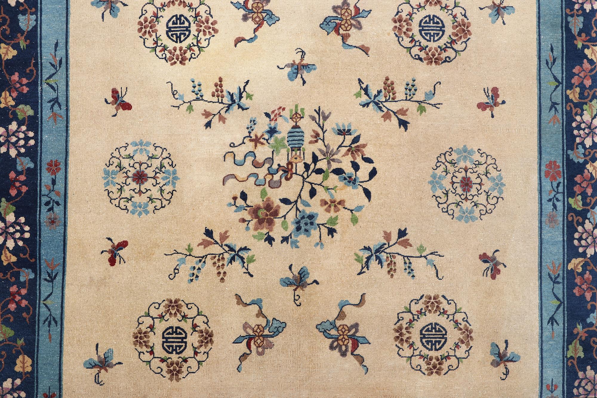 A semi-antique carpet, China, c. 350 x 275 cm.