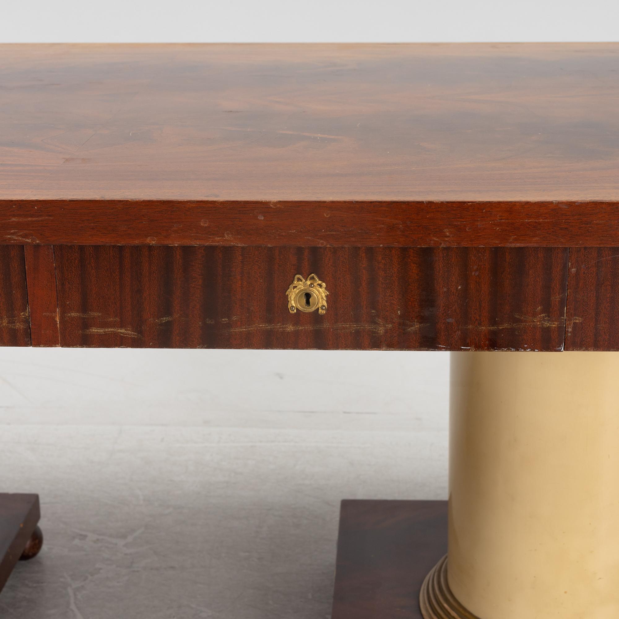 An Empire style library table, first half of the 20th century.