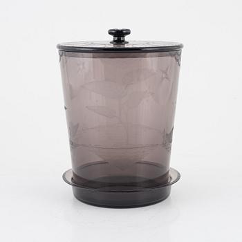 A Scandinavian glass urn with plate, dated 1930.