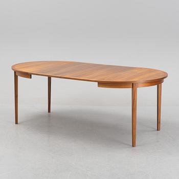 A teak veneered dining table, 1960's.