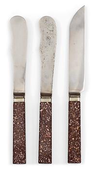 A set of three Swedish porphyry knives, circa 1900.