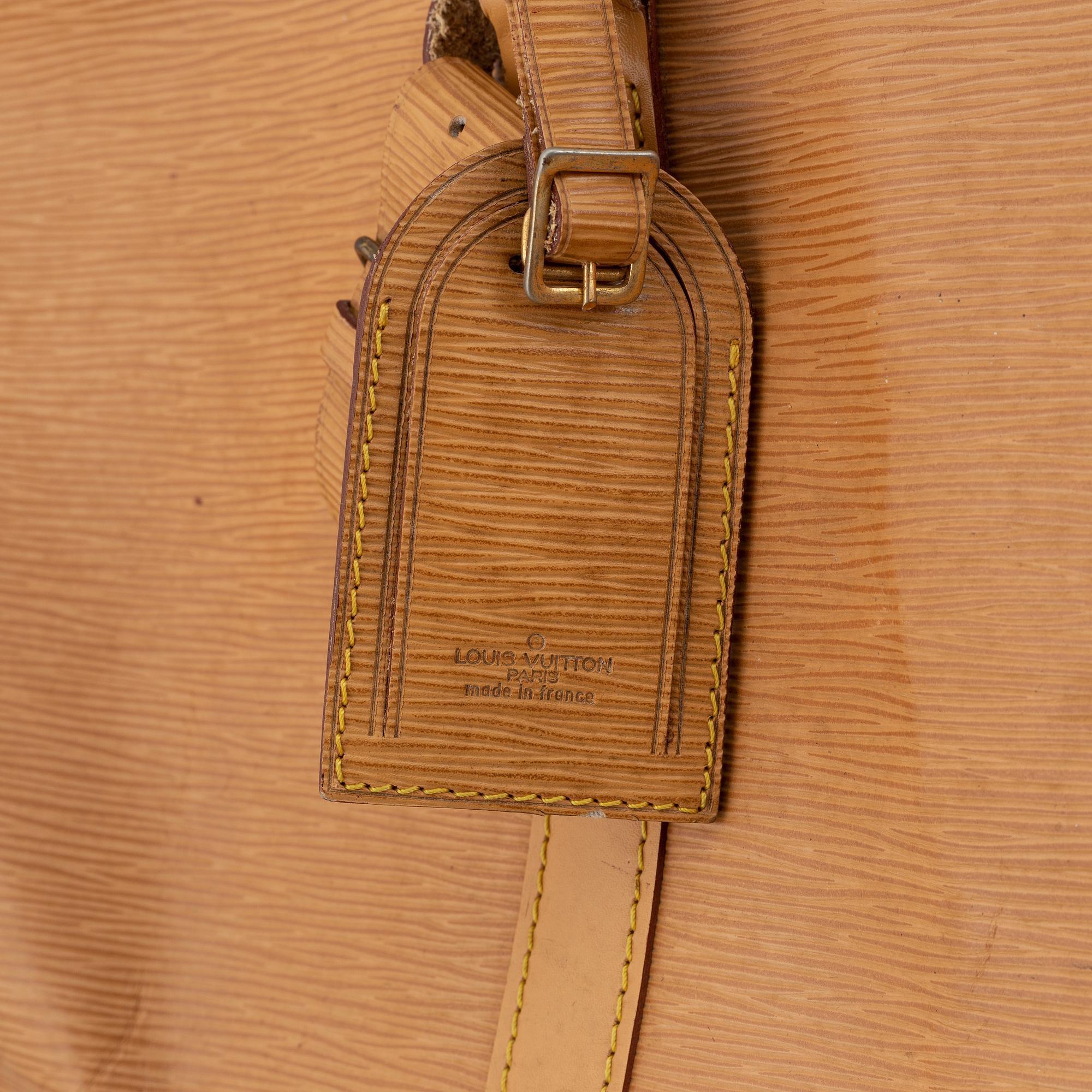 Louis Vuitton, am Epi 'Keepall 50' weekend bag.