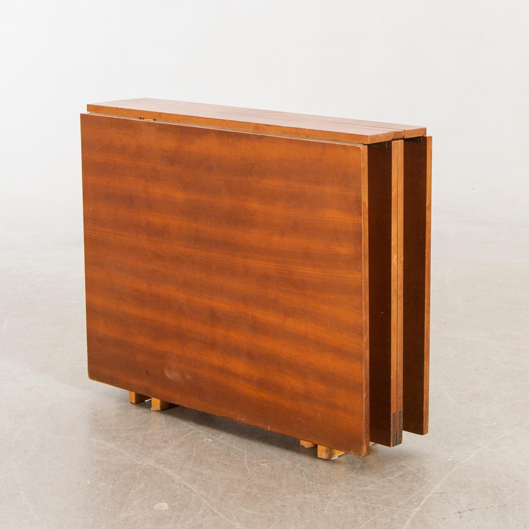 A teak and birch 'Maria Flap' gate leg table by Bruno Mathsson for Karl Mathsson.