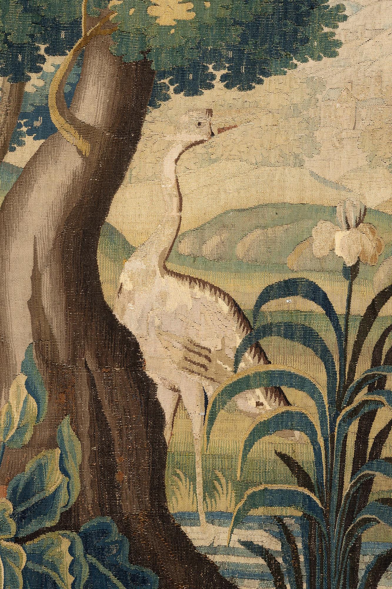 A Flemish 'verdur' tapestry, c. 283 x 290 cm, around 1700.