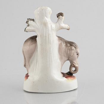 An elephant spill vase, Staffordshire, England, 19th century.