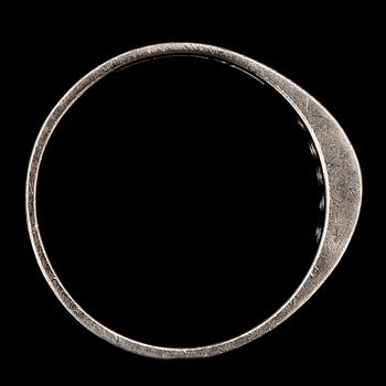 RING, 18k vitguld med åttkantsslipade diamanter tot ca0,20ct. Cedstam, Stockholm, 1981. Vikt 3,4g.