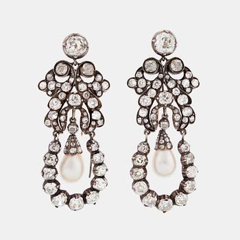 817. A PAIR OF EARRINGS set with two pear-shaped pearls and old-cut diamonds.