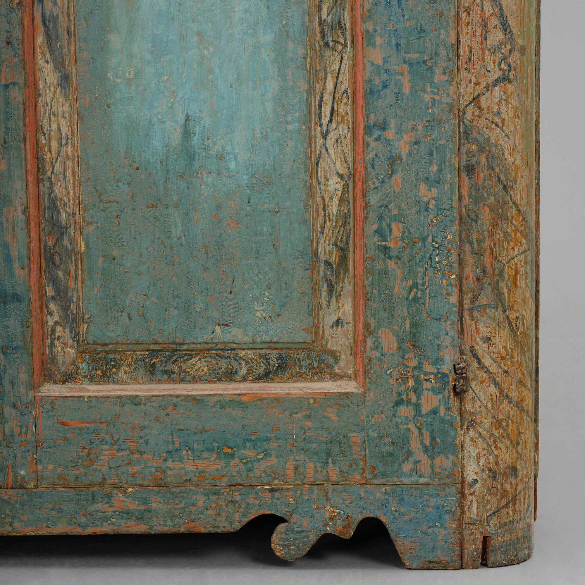 A Swedish polychrome-painted rococo cabinet, late 18th century.