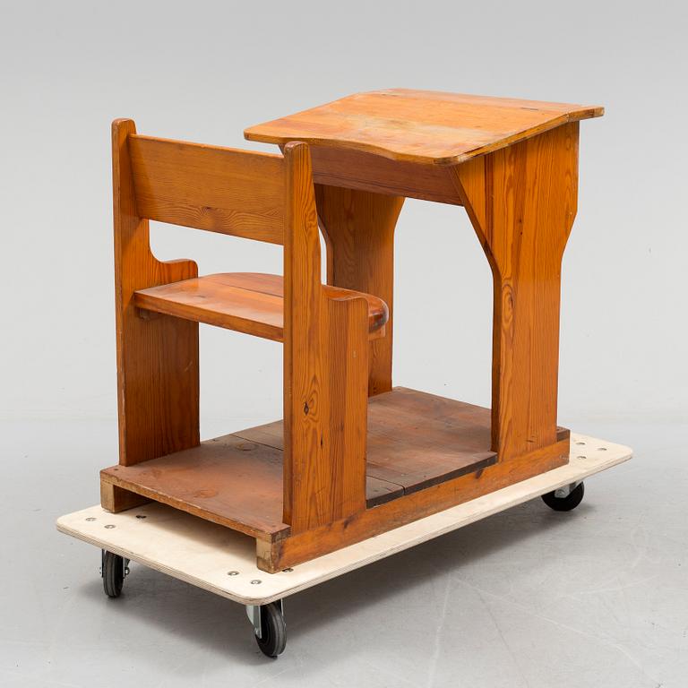 A first half of the 20th century school bench.