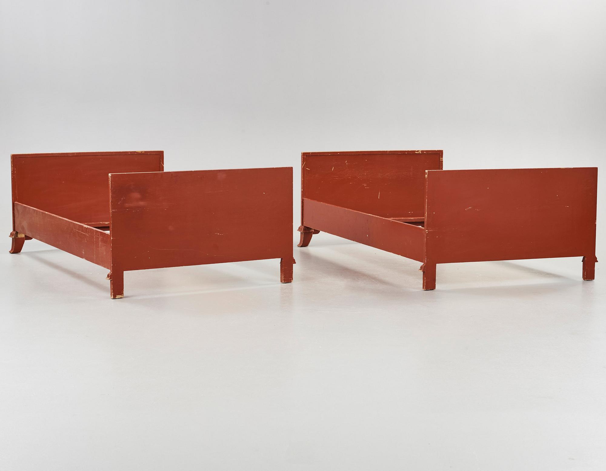 Axel Einar Hjorth, a pair of Swedish Grace 'Åbo' chinese red bed frames, Nordiska Kompaniet, ca 1929-30.