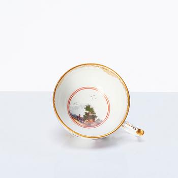A Meissen porcelain cup with stand, 18th Century.
