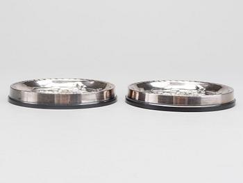 Two silver ashtray.