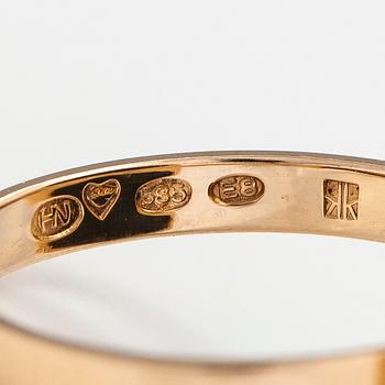 Helge Narsakka, Ring, 14K guld, spektrolit och diamant ca 0.015 ct. För Kaunis Koru, Helsingfors 1982.