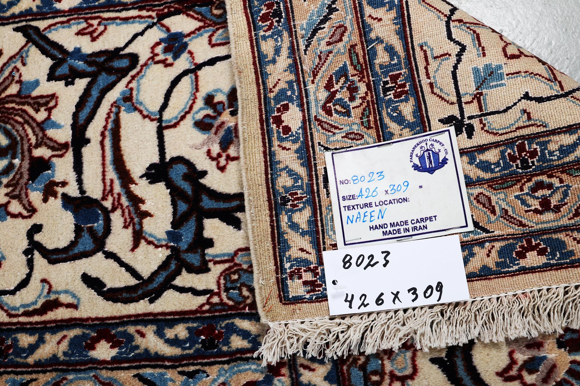A carpet, Nain, part silk, ca 426 x 309 cm.