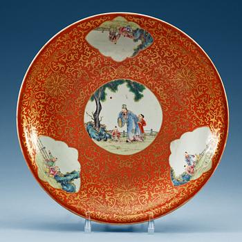 1664. A famille rose and gold dish, 20th Century. With Qianlong six character mark.