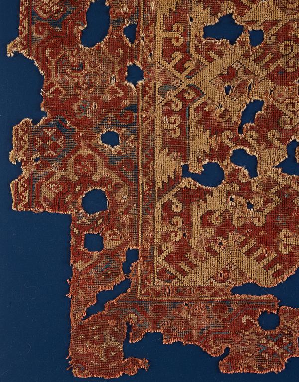 Mattfragment, antik, Västanatolisk "Lotto", 1600-tal, ca 142 x 115 cm (inklusive ram 155 x 124 cm).