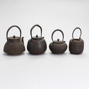 Four Japanese teapots.