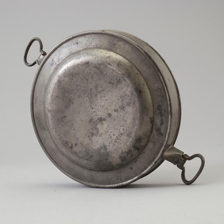 A 19th century pewter plate.