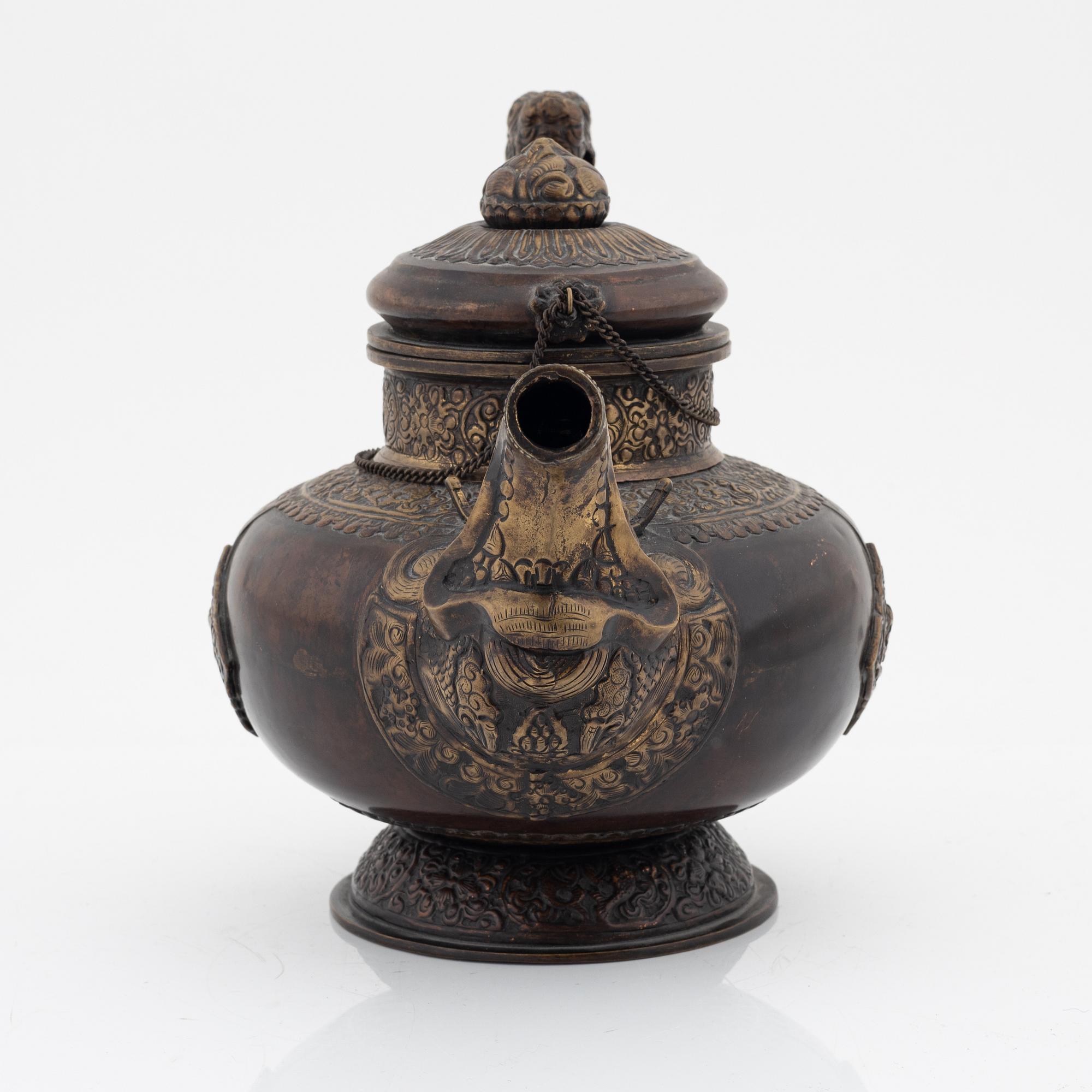 A Tibetan brass/copper teapot, circa 1900.