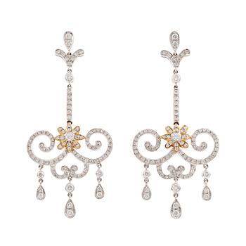 494. A pair of 18K white gold and round brilliant cut diamond chandelier earrings.