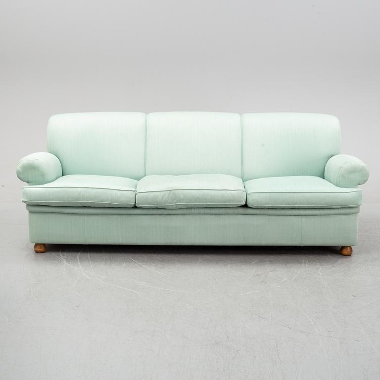 A model 703 sofa by Josef Frank for Firma Svenskt Tenn.